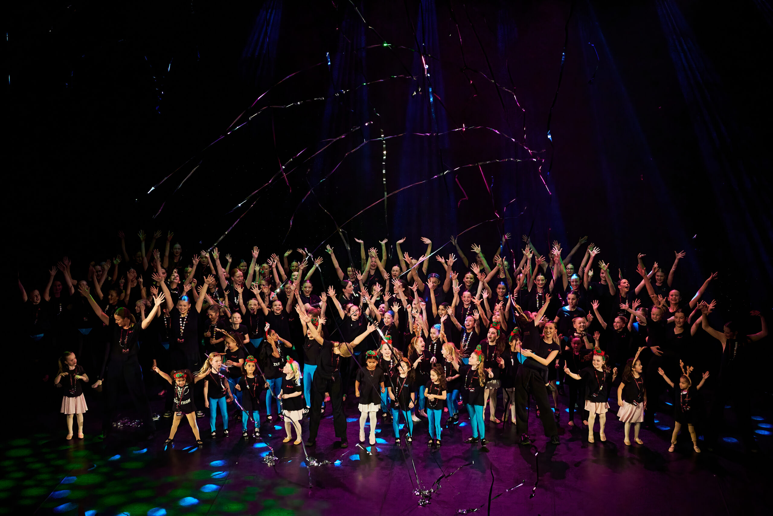 LBSD pupils celebrating together on stage at the annual Prizegiving performance